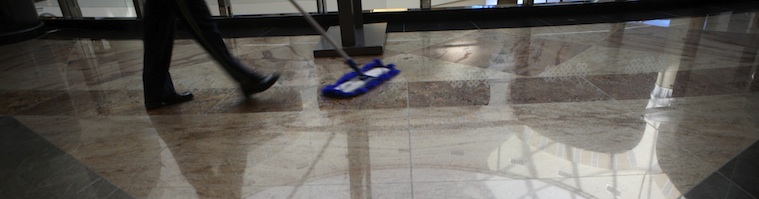 Man Cleaning Commercial Floors with Microfiber Dust Mop