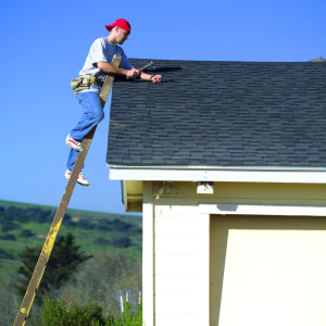 Professional Roofer Completing Repairs On A Roof In Hanover, PA